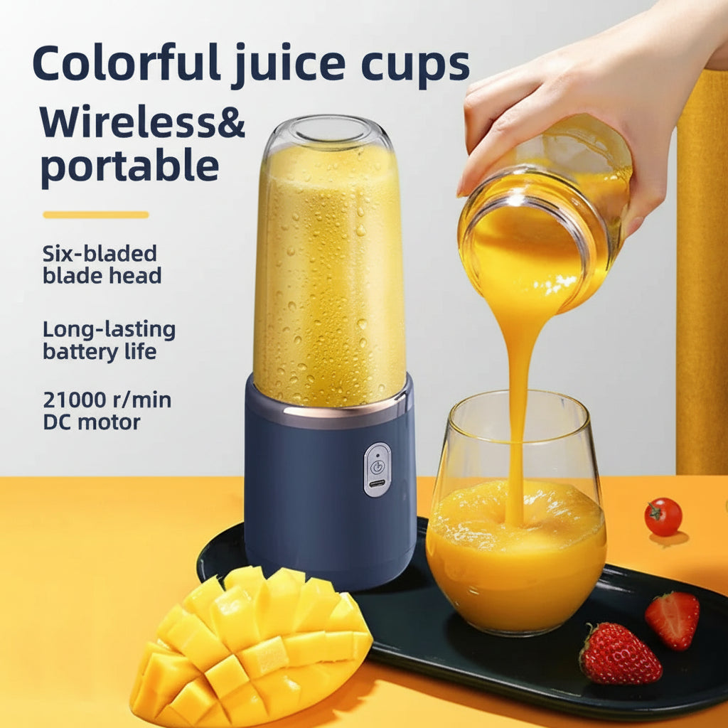 Portable blender with a glass of  juice, mango slices, and strawberries on a yellow background.