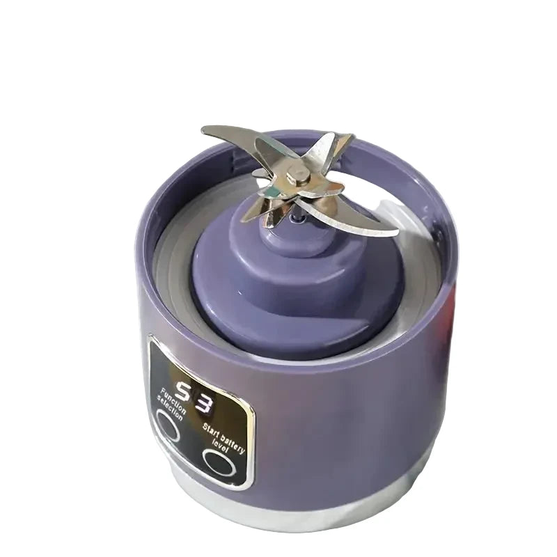 Purple blender with stainless steel blades on a kitchen counter
